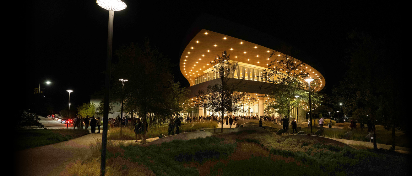 A nighttime view of Hancher Auditorium after a performance