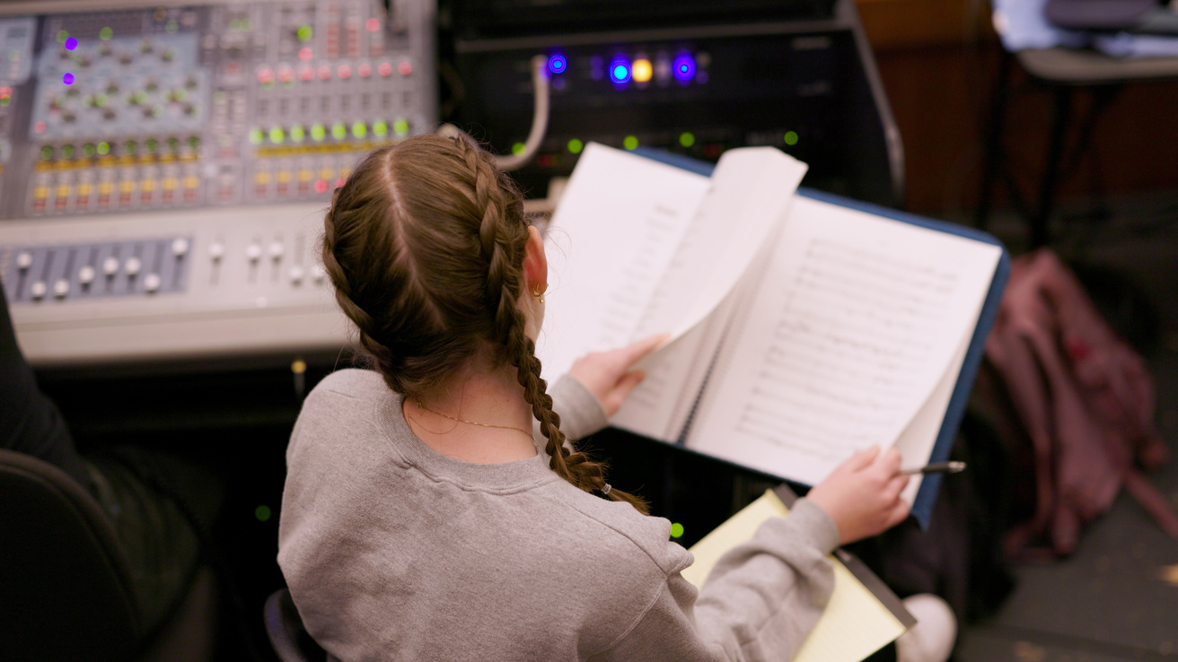 UI student assistant stage manager during a rehearsal for Fierce at Hancher