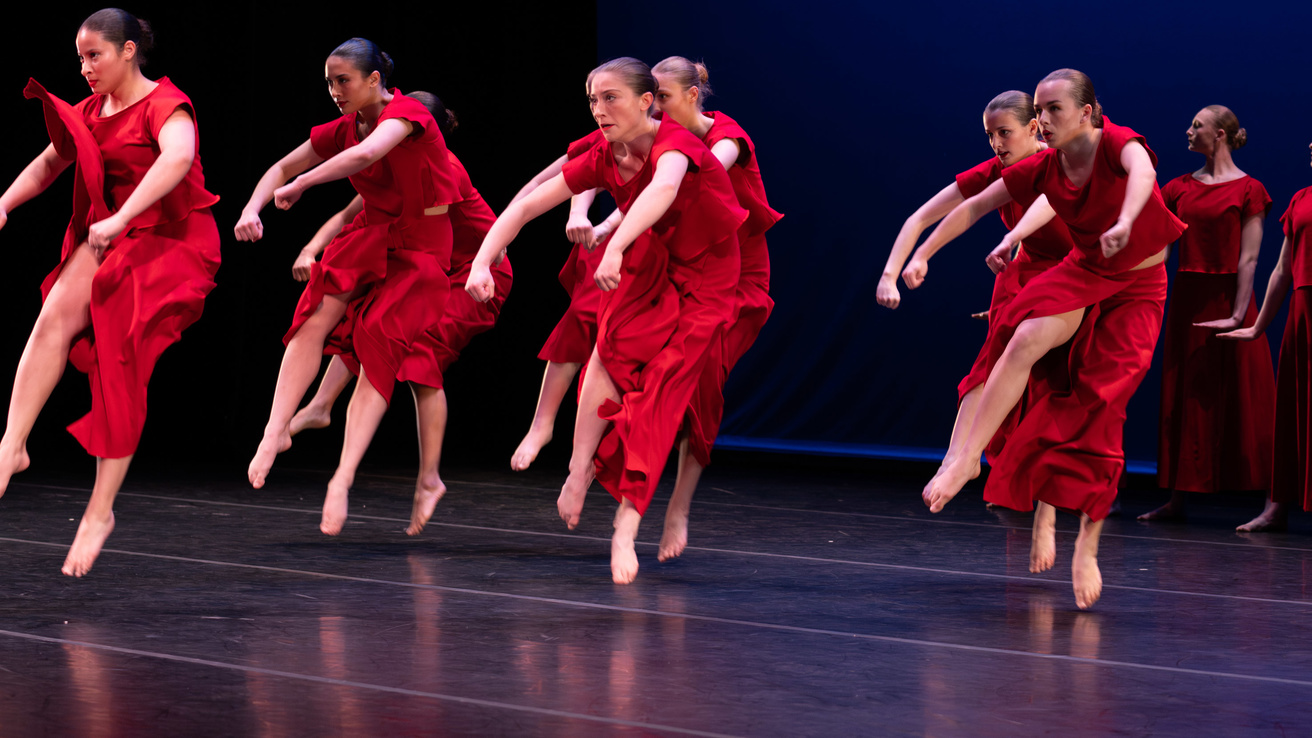 University of Iowa Department of Dance students, dressed in flowing red costumes, perform Martha Graham's Panorama